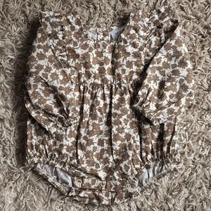 Mebie Baby one piece. Cream with brown and green floral print. 0-3months.